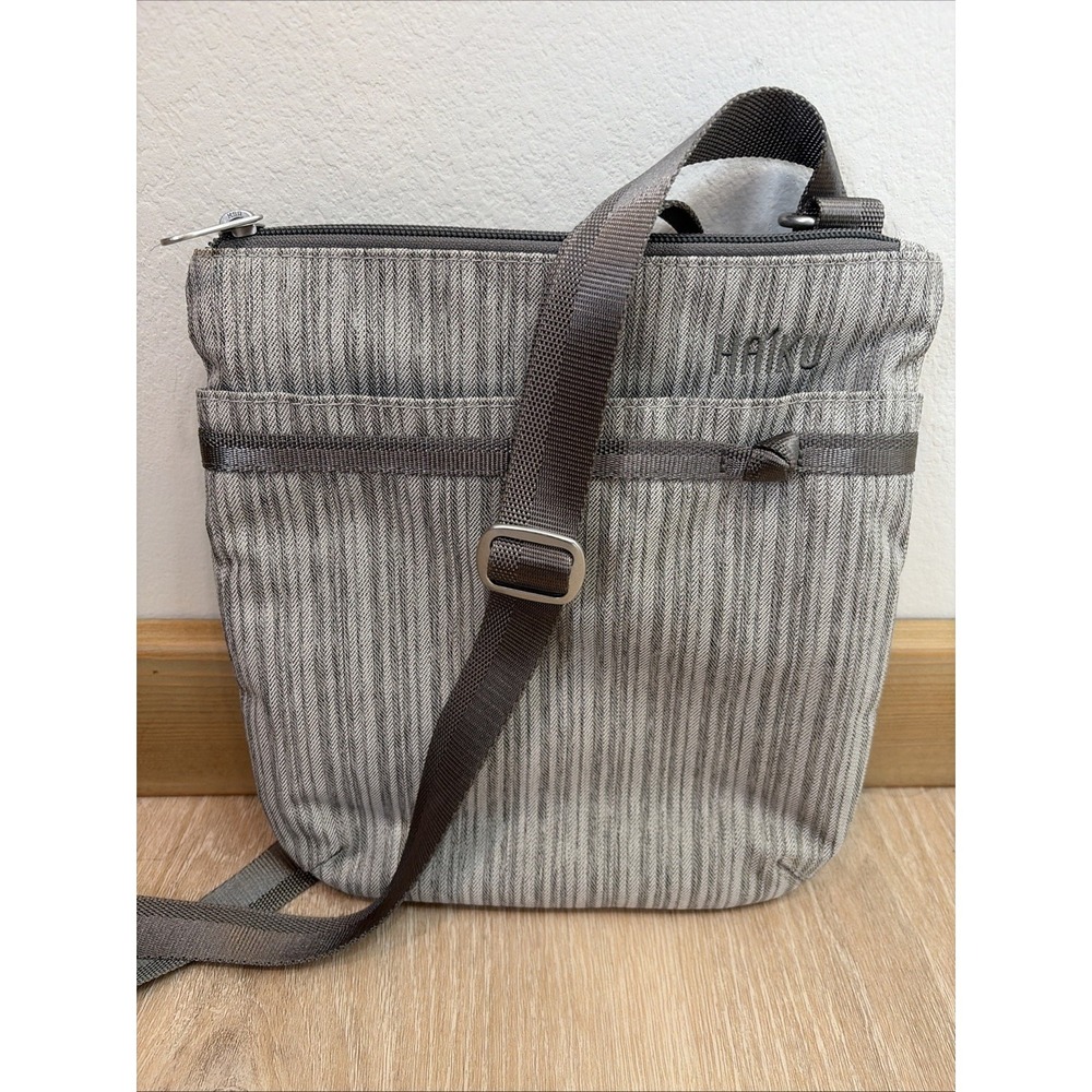 NWOT Haiku REVEL Crossbody Purse RFID Blocking Gray Packable Tote Adjustable
